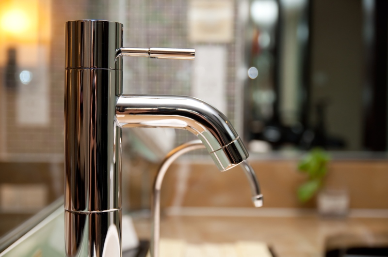 Leaking tap being repaired in Tufnell Park